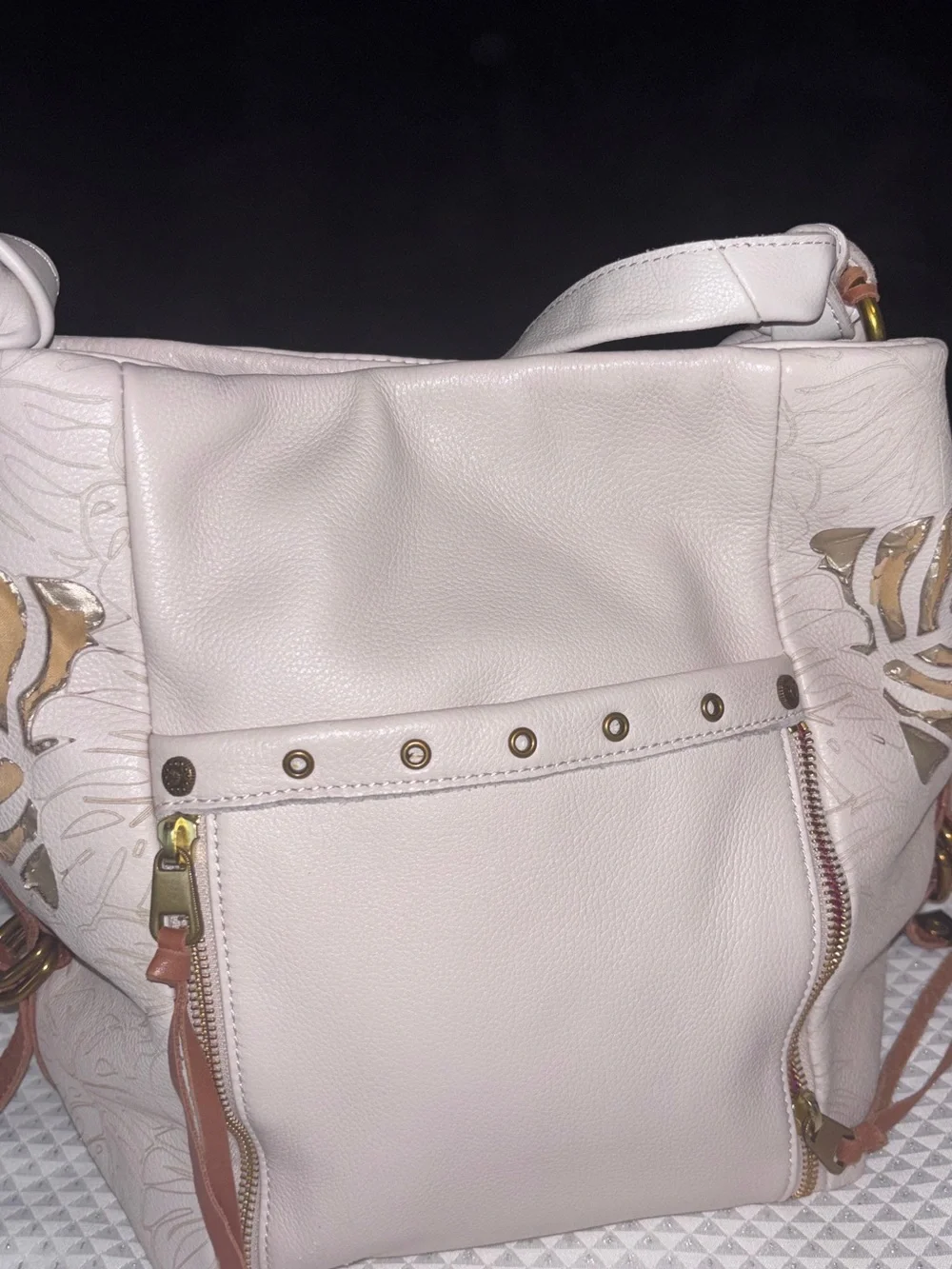 The Sak Cream Leather Shoulder Bag with Floral Cutout Accents